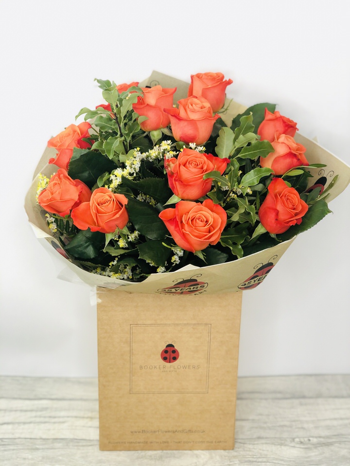 <h2>Dozen Orange Roses - Hand Delivered</h2>
<br>
<ul>
<li>Approximate Dimensions: 55cm x 35cm</li>
<li>Flowers arranged by hand and gift wrapped in our signature eco-friendly packaging and finished off with a hidden wooden ladybird</li>
<li>To give you the best occasionally we may make substitutes</li>
<li>Our flowers backed by our 7 days freshness guarantee</li>
<li>For delivery area coverage see below</li>
</ul>
<br>
<h2>Flower Delivery Coverage</h2>
<p>Our shop delivers flowers to the following Liverpool postcodes L1 L2 L3 L4 L5 L6 L7 L8 L11 L12 L13 L14 L15 L16 L17 L18 L19 L24 L25 L26 L27 L36 L70 If your order is for an area outside of these we can organise delivery for you through our network of florists. We will ask them to make as close as possible to the image but because of the difference in stock and sundry items it may not be exact.</p>
<br>
<h2>Hand-tied Bouquet | Flowers in box with water</h2>
<p>These beautiful flowers hand-arranged by our professional florists into a hand-tied bouquet are a delightful choice from our new Autumn collection. This bouquet of roses would make the perfect gift for any occasion or to let someone know you are thinking of them.</p>
<br>
<p>Handtied bouquets are a lovely display of fresh flowers that have the wow factor. The advantage of having a bouquet made this way is that they are artfully arranged by our florists and tied so that they stay in the display.</p>
<br>
<p>They are then gift wrapped and aqua packed in a water bubble so that at no point are the flowers out of water. This means they look their very best on the day they arrive and continue to delight for days after.</p>
<br>
<p>Being delivered in a transporter box and in water means the recipient does not need to put the flowers in a vase straight away they can just put them down and enjoy.</p>
<br>
<p>Featuring 12 orange large-headed roses and gypsophila together with mixed seasonal foliages.</p>
<br>
<h2>Eco-Friendly Liverpool Florists</h2>
<p>As florists we feel very close earth and want to protect it. Plastic waste is a huge problem in the florist industry so we made the decision to make our packaging eco-friendly.</p>
<p>To achieve this we worked with our packaging supplier to remove the lamination off our boxes and wrap the tops in an Eco Flowerwrap which means it easily compostable or can be fully recycled.</p>
<p>Once you have finished enjoying your flowers from us they will go back into growing more flowers! Only a small amount of plastic is used as a water bubble and this is biodegradable.</p>
<p>Even the sachet of flower food included with your bouquet is compostable.</p>
<p>All our bouquets have small wooden ladybird hidden amongst them so do not forget to spot the ladybird and post a picture on our social media pages to enter our rolling competition.</p>
<br>
<h2>Flowers Guaranteed for 7 Days</h2>
<p>Our 7-day freshness guarantee should give you confidence that we will only send out good quality flowers.</p>
<p>Leave it in our hands we will create a marvellous bouquet which will not only look good on arrival but will continue to delight as the flowers bloom.</p>
<br>
<h2>Liverpool Flower Delivery</h2>
<p>We are open 7 days a week and offer advanced booking flower delivery same-day flower delivery 3-hour flower delivery. Guaranteed AM PM or Evening Flower Delivery and also offer Sunday Flower Delivery.</p>
<p>Our florists deliver in Liverpool and can provide flowers for you in Liverpool Merseyside. And through our network of florists can organise flower deliveries for you nationwide.</p>
<br>
<h2>The Best Florist in Liverpool your local Liverpool Flower Shop</h2>
<p>Come to Booker Flowers and Gifts Liverpool for your beautiful flowers and plants. For that bit of extra luxury we also offer a lovely range of finishing touches such as wines champagne locally crafted Gin and Rum Vases Scented Candles and Chocolates that can be delivered with your flowers.</p>
<p>To see the full range see our extras section.</p>
<p>You can trust Booker Flowers and Gifts of delivery the very best for you.</p>
<p><br /><br /></p>
<p><em>5 Star review on Yell.com</em></p>
<br>
<p><em>Thank you Gemma for your fabulous service. The flowers are of the highest quality and delivered with a warm smile. My sister was delighted. Ordering was simple and the communications were top-notch. I will definitely use your services again.</em></p>